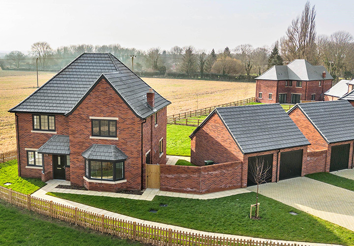 A detached, five bedroom, brick built home at the end of the street with a double garage. Looking out over lush fields.