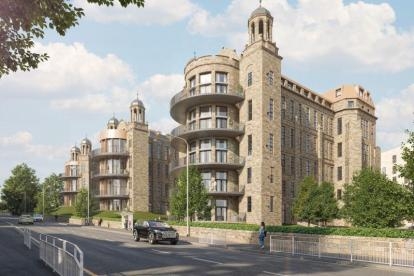 Street view of The Nightingale Collection showing two adjoining historic stone buildings with rounded balconies and decorative towers. The architecture blends traditional stonework with modern design elements.